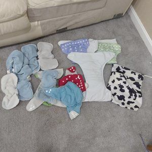 6 cloth diapers and a wet bag